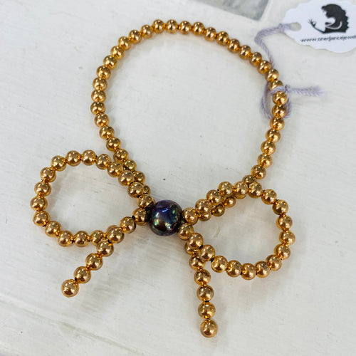 Bow stretch bracelet or ring class, Thursday, October 23rd, 6-8pm