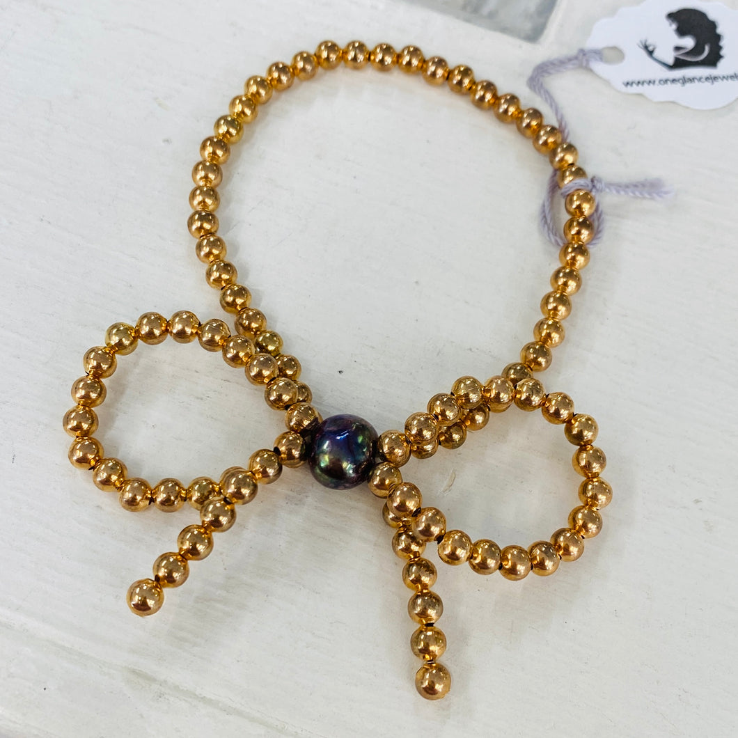 Bow stretch bracelet or ring class, Thursday, October 23rd, 6-8pm