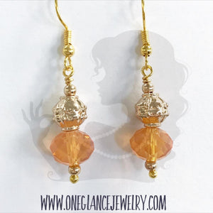 Orange crystal with gold accents earrings