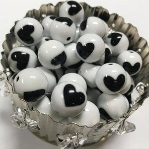 Acrylic black and white heart beads