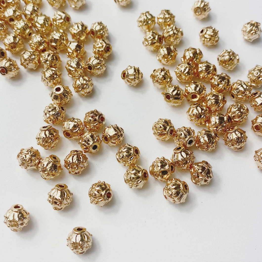 Soft gold decorative bead